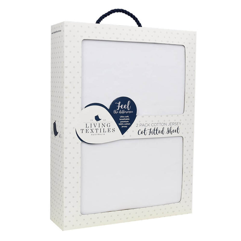 Boxed set of Living Textiles Cot Fitted Sheet Jersey 2pk, featuring premium cotton sheets in a white box with grey dots, a carry handle, and a heart-shaped front label.