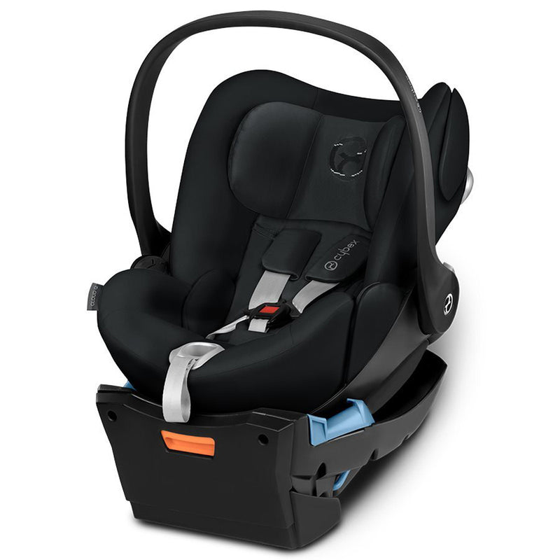 The Cybex Cloud Q Capsule + Base by Cybex is a black baby capsule car seat with a handle, five-point harness, padded headrest, side-impact protection, and a detachable base with blue and orange accents.
