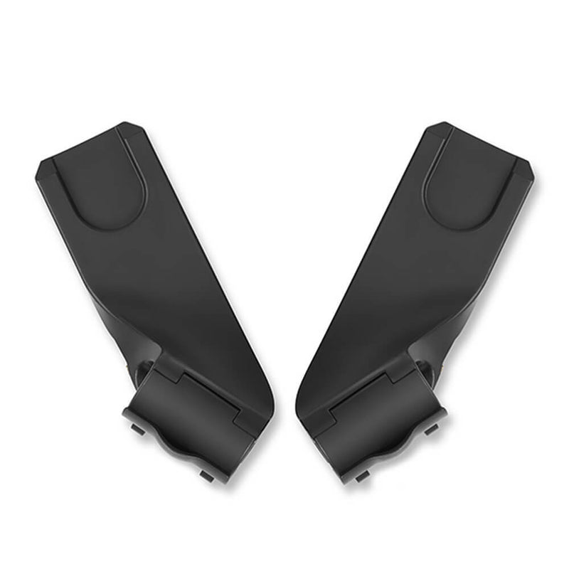 Two black plastic Cybex Eezy S Adaptors, featuring curved tops and notched bases, are shown facing each other on a white background. These adaptors enable secure attachment of a CYBEX infant car seat or use in a 3-in-1 Travel System.