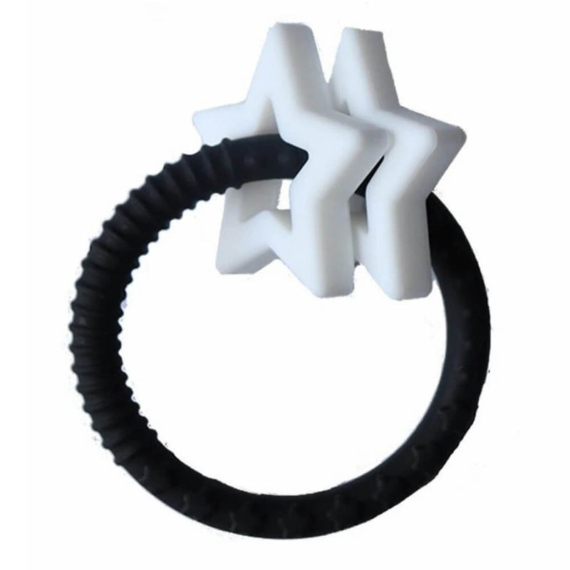 The Jellystone Star Teether by Jellystone is a black circular silicone ring with two white star-shaped attachments on one side. BPA free and textured for grip, it’s set against a plain white background.