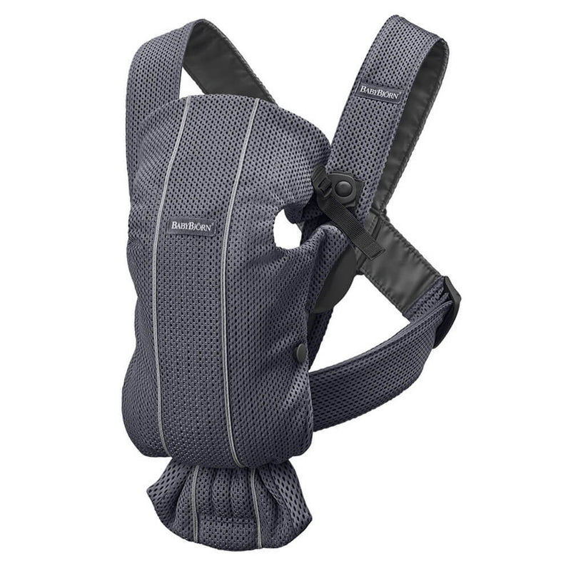 The BabyBjorn Carrier Mini 3D Mesh is a gray baby carrier for newborns, featuring padded shoulder straps and adjustable fasteners to keep your baby secure against your chest.
