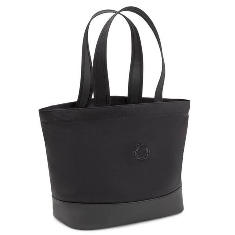 The Bugaboo Changing Bag by Bugaboo is a black tote with dual handles, a subtle circular logo, and a slightly shinier base—an elegant pram changing bag designed for busy parents on the go.