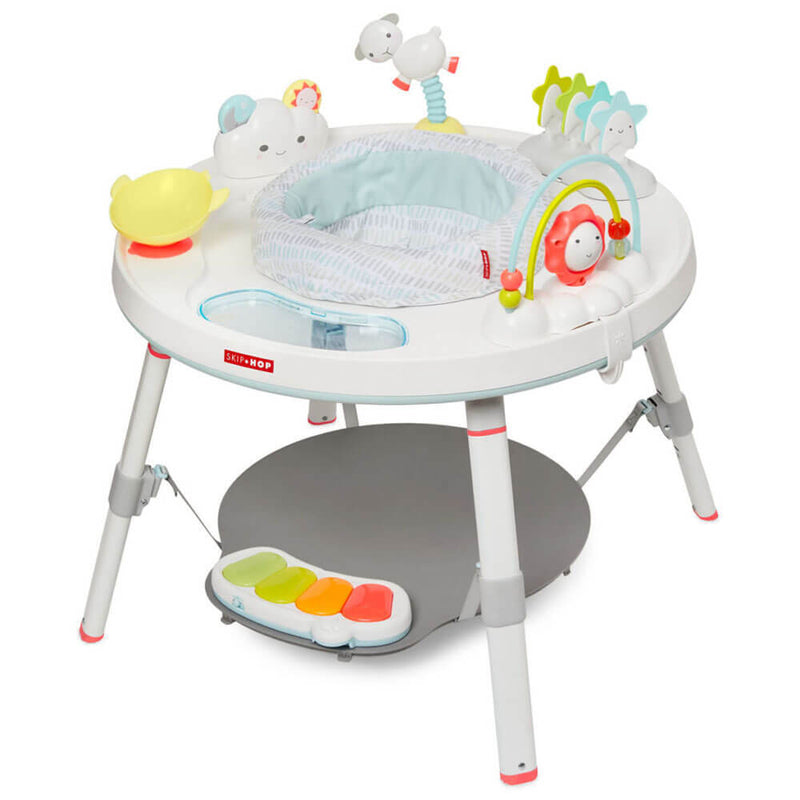 The Skip Hop Silver Lining Cloud Activity Centre features a round seat, colorful interactive toys, a foot pad with four colored keys, and converts to a play table as your baby grows.