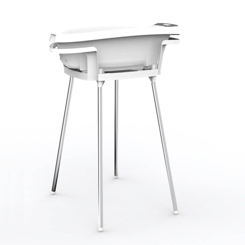 The Roger Armstrong Aquascale Bath Stand is a modern white baby bathtub with four slim metal legs, designed for easy adult access and use. The product is set against a plain white background.