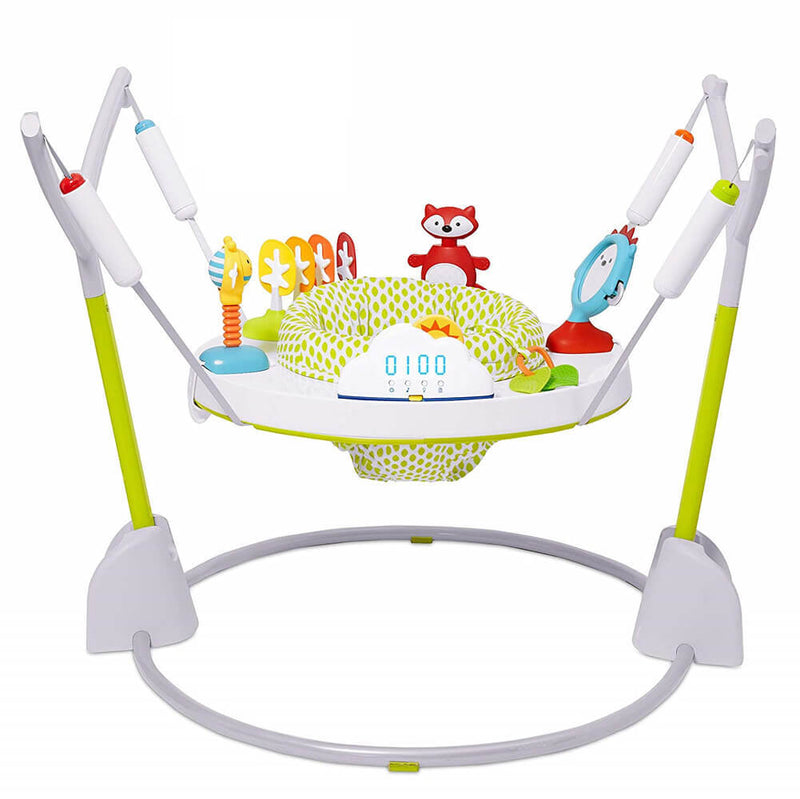 The Skip Hop Explore & More Jumpscape Fold Away Jumper is a vibrant baby jumper with a padded 360° rotating seat, four supports on a circular base, and playful animal toys plus interactive features for nonstop fun.