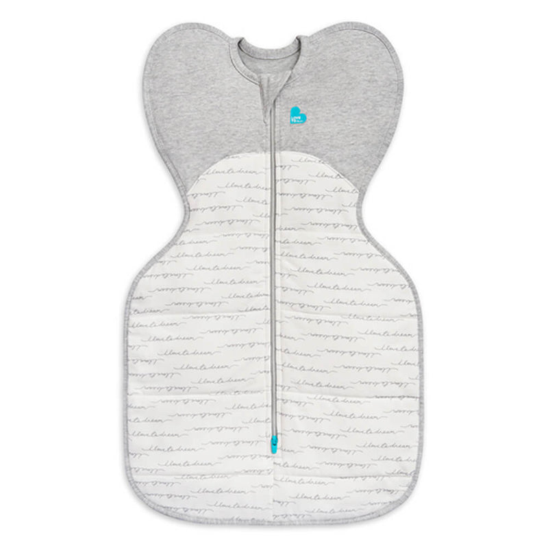 The Love To Dream Swaddle UP Warm 2.5 Tog by Love To Dream features solid gray top, white bottom with gray script, wing-shaped shoulders, a heart-shaped blue neck logo, and a center zipper for easy self-soothing comfort.