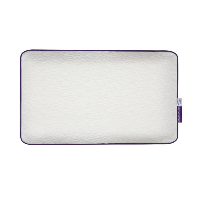 A rectangular white ClevaFoam Baby Pillow by Clevamama with a textured, breathable surface and dark purple trim is shown on a plain background. Designed to help prevent Flat Head Syndrome, it has a small brand tag on the right side.