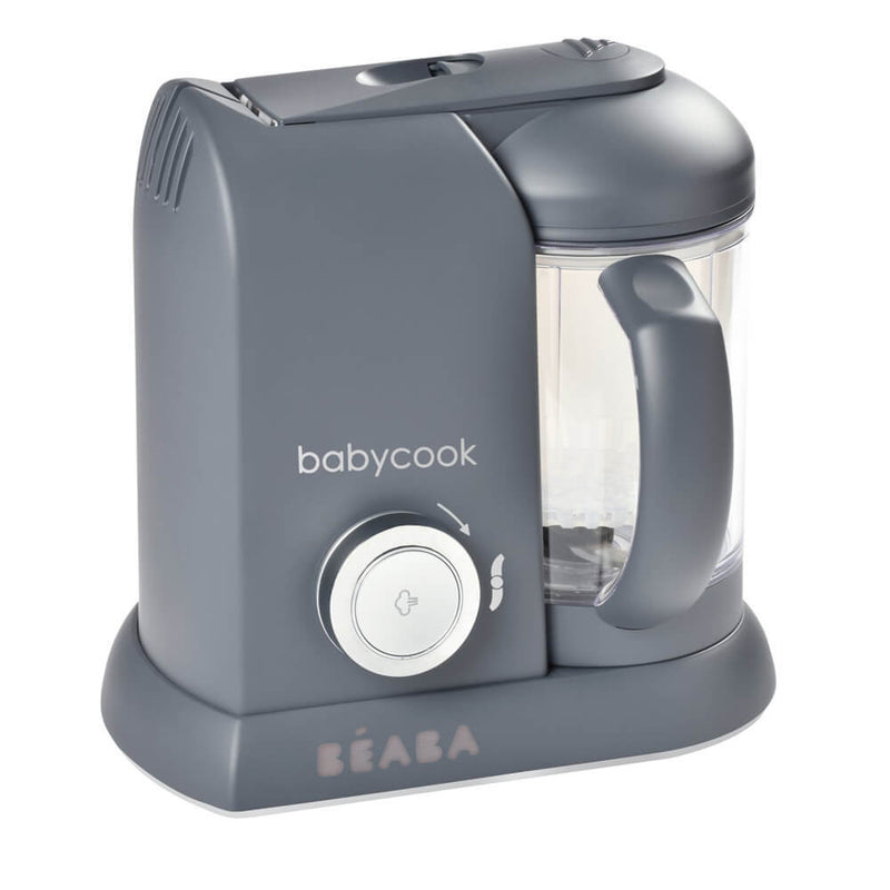 The Beaba Babycook Solo 4-in-1 Steamer Blender Baby Food Maker has a sleek gray design, a clear handled blending container, and front control knob—ideal for convenient steaming and blending of homemade baby food.