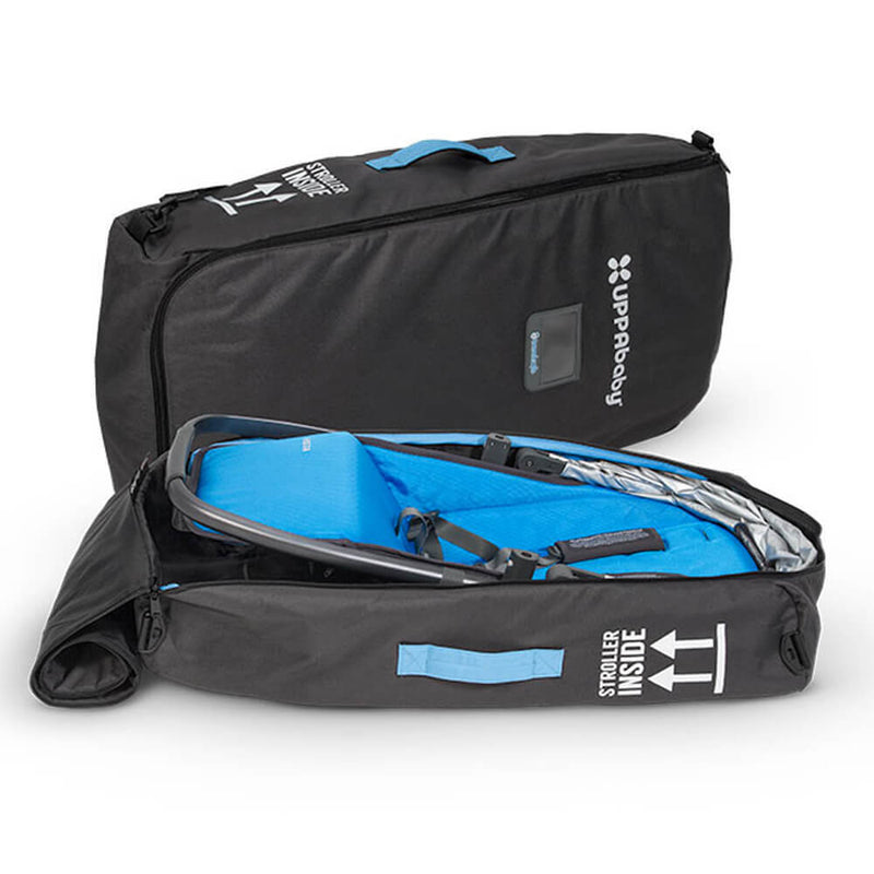 The UPPAbaby Travel Bag for Rumble Seat or Bassinet, in black with blue accents and “Stroller Inside” text, features handles and visible UPPAbaby branding. This durable bag protects your Rumble Seat or bassinet during travel.