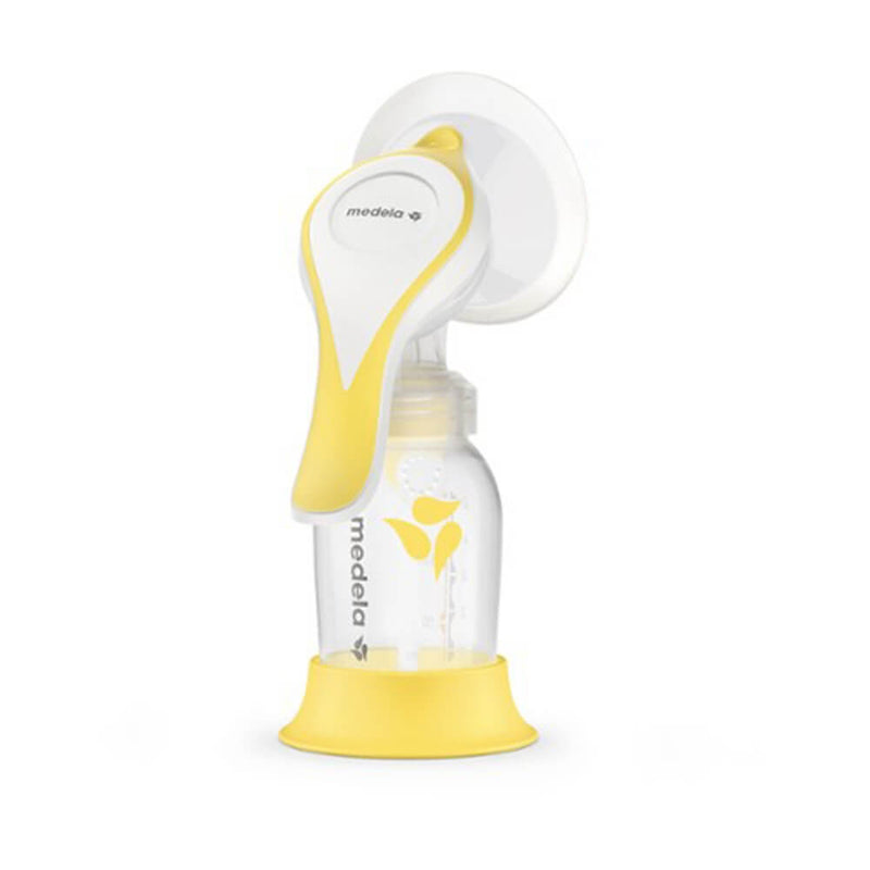 The Medela Harmony Breast Pump With Flex by Medela features a yellow and white handle, clear bottle with yellow accents and butterfly design, and sits securely in a matching yellow base.