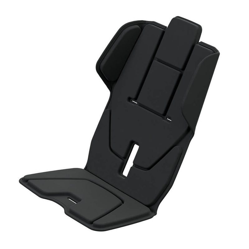 The Thule Chariot Padding by Thule is a black, contoured portable seat cushion with raised side supports and segmented padding for ergonomic back and seat support, enhancing child comfort.
