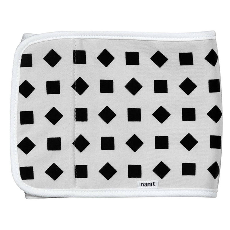 The Nanit Breathing Band is a white rectangular band with black diamond rows, white edges, and a "nanit" tag at the bottom. Designed by Nanit, it pairs with the Nanit Pro camera.