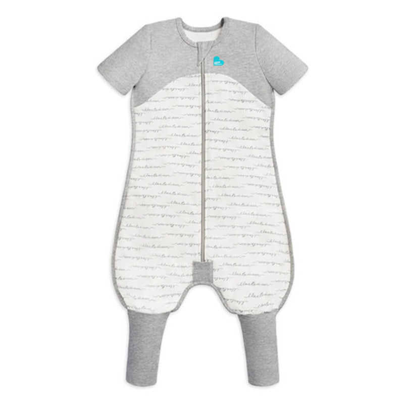 The Love To Dream Sleep Suit 1.0 Tog by Love To Dream is a gray and white sleep suit with legs, made from 100% natural cotton, featuring short sleeves, long legs, a front zipper, and gray panels for a cozy finish.