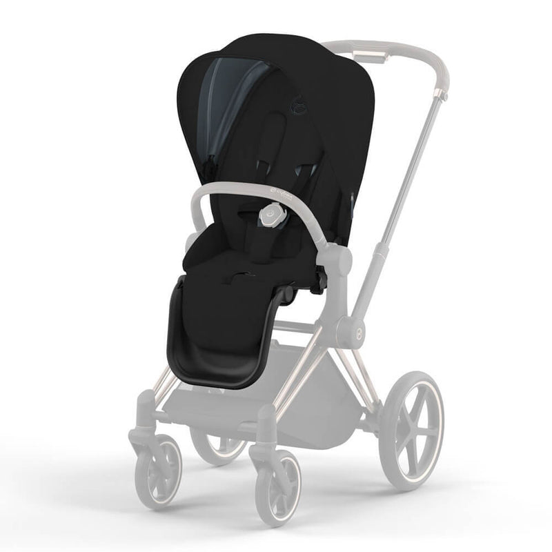 A black Cybex Priam Seat Pack, with standout UPF50+ sun canopy, is attached to a stroller frame. The seat pack by Cybex is in focus while the frame is semi-transparent, highlighting its key stroller accessory features.