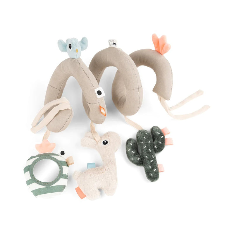 The Done By Deer Activity Spiral by Done By Deer is a soft, beige stroller toy featuring plush figures—a blue bird, white rabbit, green cactus, and striped ring—designed to engage and entertain babies with sensory play.