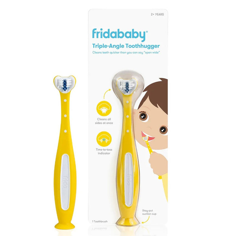 Two yellow Frida Baby Tooth Hugger toothbrushes by Frida Baby—one in packaging, one outside—designed for kids with soft bristles and playful packaging featuring a cartoon child brushing their teeth.