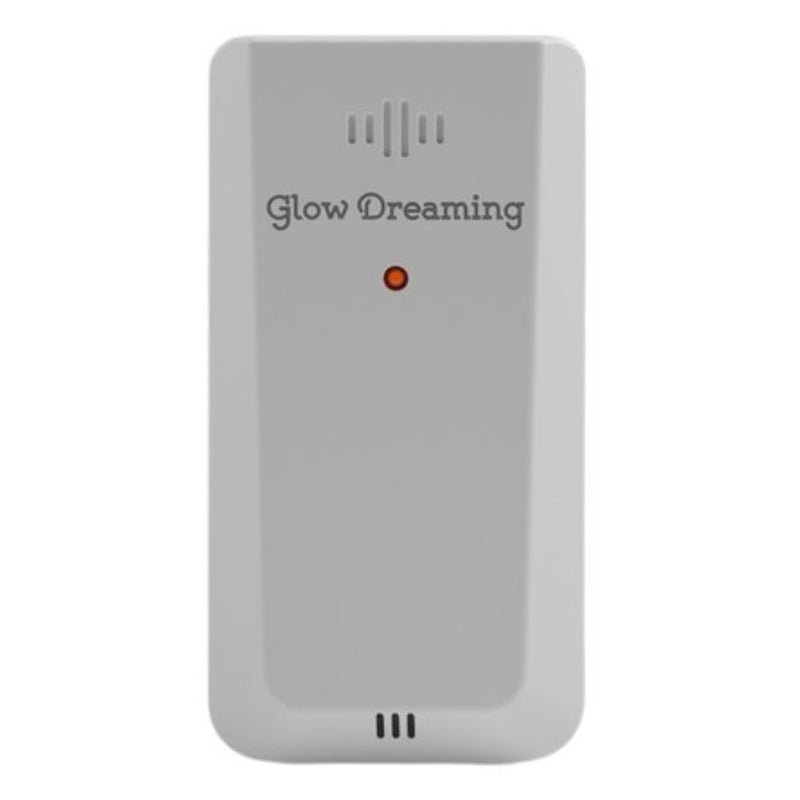The Glow Dreaming Room Sensor is a white, rectangular device with vented slits and an orange indicator light, designed to monitor your baby’s room for optimal comfort.