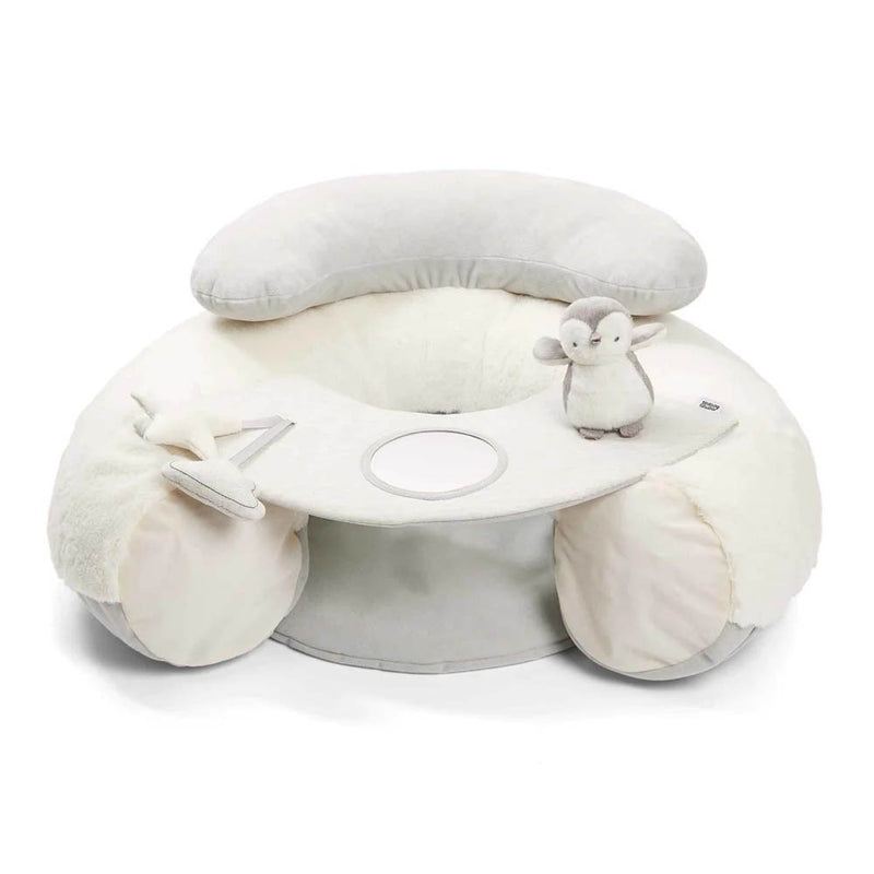 The Mamas & Papas Wish Upon A Cloud Sit & Play Baby Floor Seat is a plush white seat with a supportive backrest, padded arms, built-in tray with mirror, plush star toy, and stuffed penguin for baby sit-and-play fun.