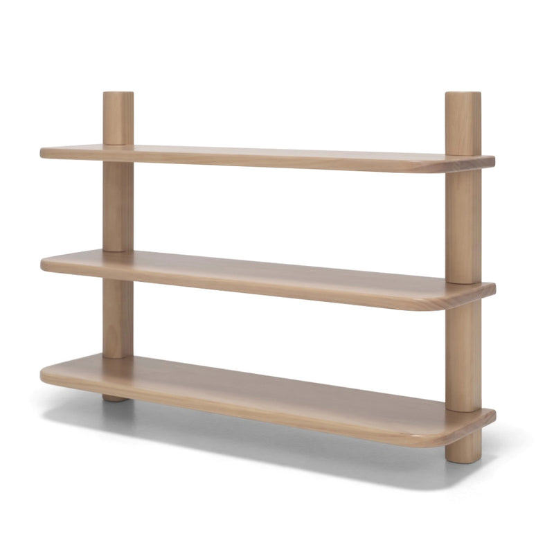 The Seena Willow Shelves by Seena feature three light pine tiers with rounded corners and cylindrical supports, adding contemporary style to any space set against a plain white background.