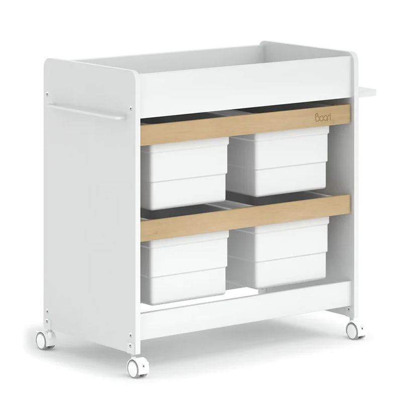 The Boori Natty Storage Changer by Boori is a white, modern rolling cart with four caster wheels, two wooden shelves, four white bins, and a side handle—perfect for keeping nursery essentials organized and within easy reach.