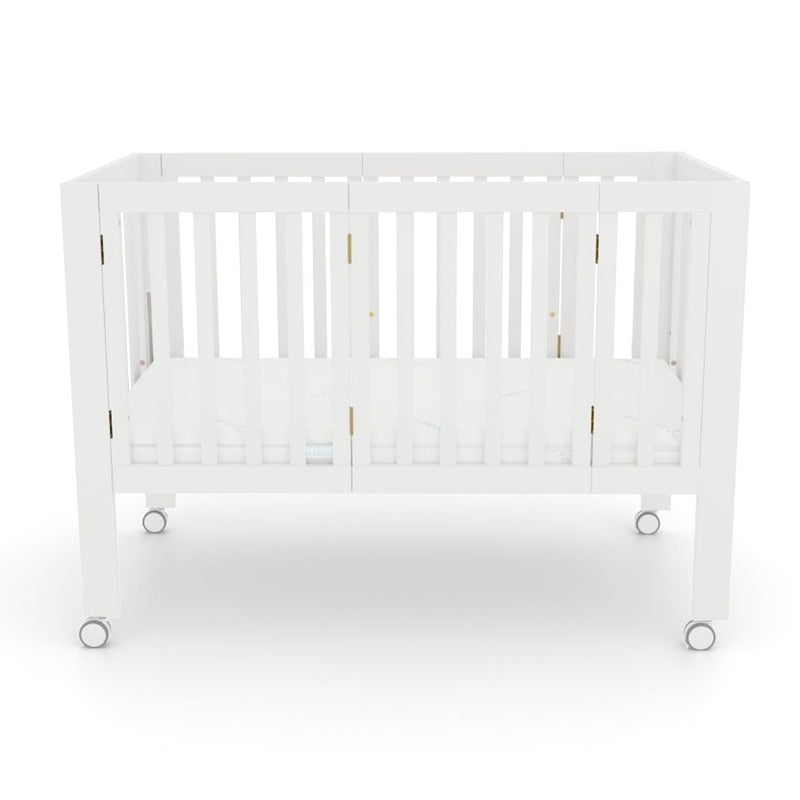 The BabyRest Dixie Folding Cot + Mattress by BabyRest features a compact, white design with slatted sides, four wheels, and an included mattress—perfect for easy movement and convenience.