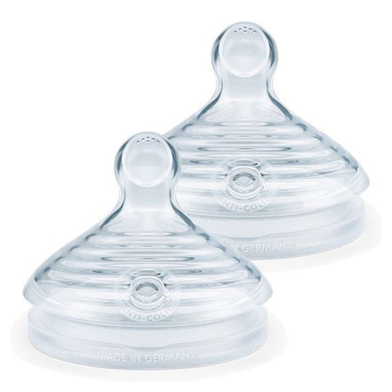 Two Nuk For Nature Teat 2pk Medium bottle teats, made from clear silicone with anti-colic vents and a ribbed, wide base design, are shown side by side on a white background for comfortable, sustainable feeding.