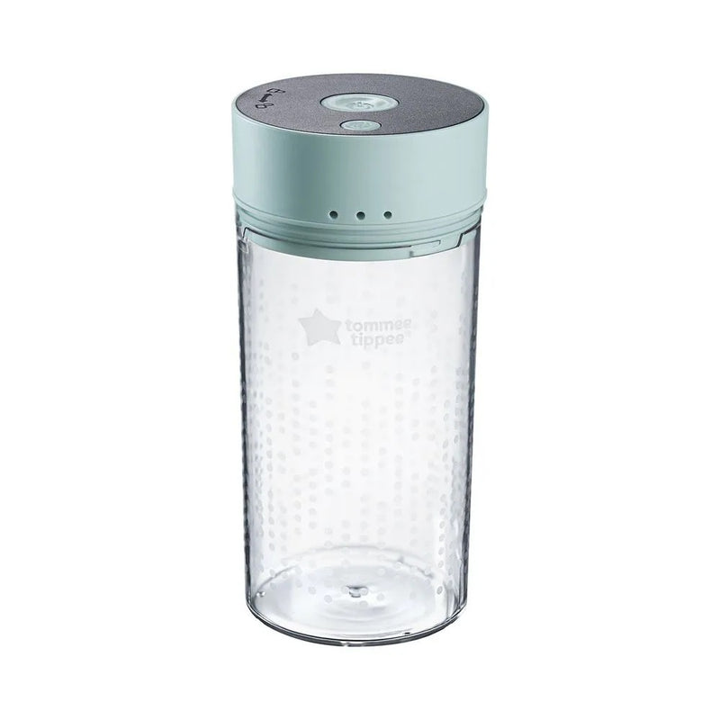 The Tommee Tippee Colicsoothe Milk Air Remover features a clear, textured cup with a light blue lid and ventilation holes, designed by Tommee Tippee to gently relieve colic in babies.