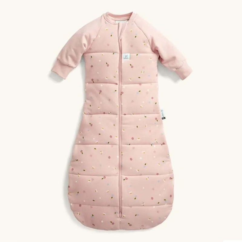 The ErgoPouch 2.5 Tog Jersey Sleeping Bag With Sleeves Daisies by ErgoPouch is a pink, long-sleeved baby sleep bag with a front zipper and daisy patterns, designed for safe sleep, shown on a plain light background.