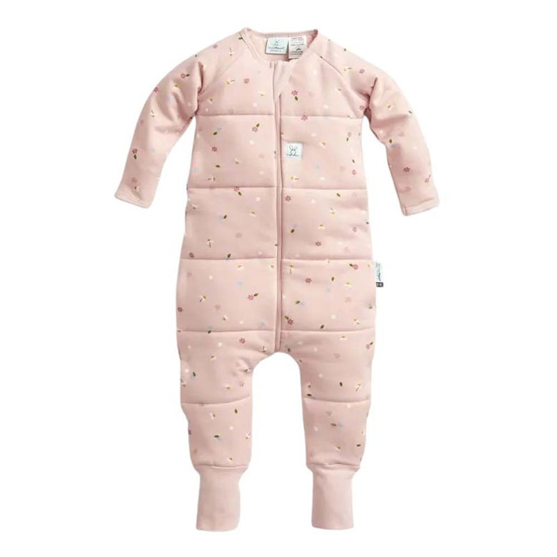 The ErgoPouch 2.5 Tog Sleep Onesie Daisies by ErgoPouch is a pink, long-sleeved, footless onesie with daisy prints, padded sections, and a front zipper. Made from organic cotton, it's a TOG-rated alternative to sleeping bags for cozy sleep.