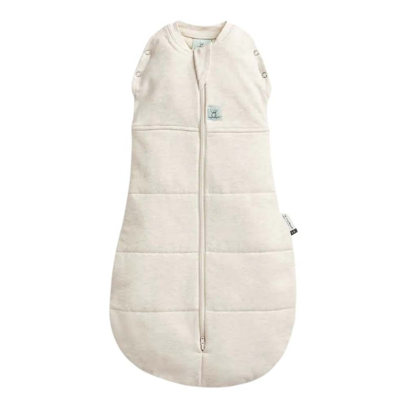 The ErgoPouch 2.5 Tog Cocoon Swaddle Oatmeal Marle by ErgoPouch is a beige, sleeveless, organic cotton swaddle with a front zipper and snap buttons on the shoulders, shown on a white background.