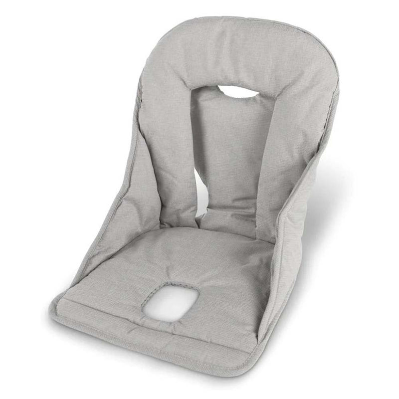 The UPPAbaby Ciro High Chair Cushion is a light gray, padded infant seat liner with soft fabric, supportive sides, high back, and two strap openings for comfort and safety.