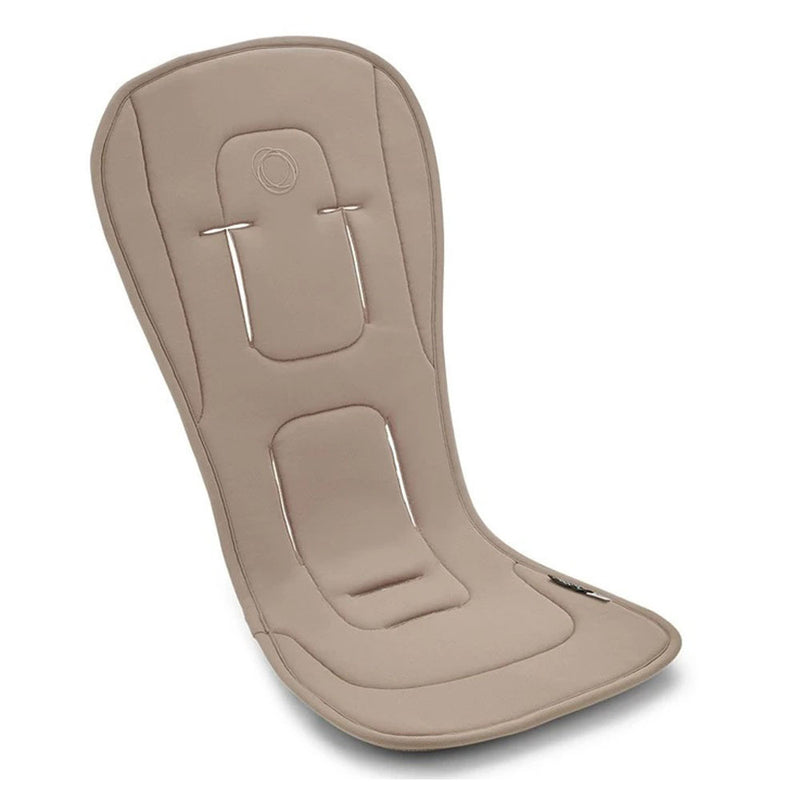 The Bugaboo Dual Comfort Seat Liner by Bugaboo is a beige, padded, breathable liner with stitched sections, harness slots, and a curved shape for a perfect stroller seat fit.