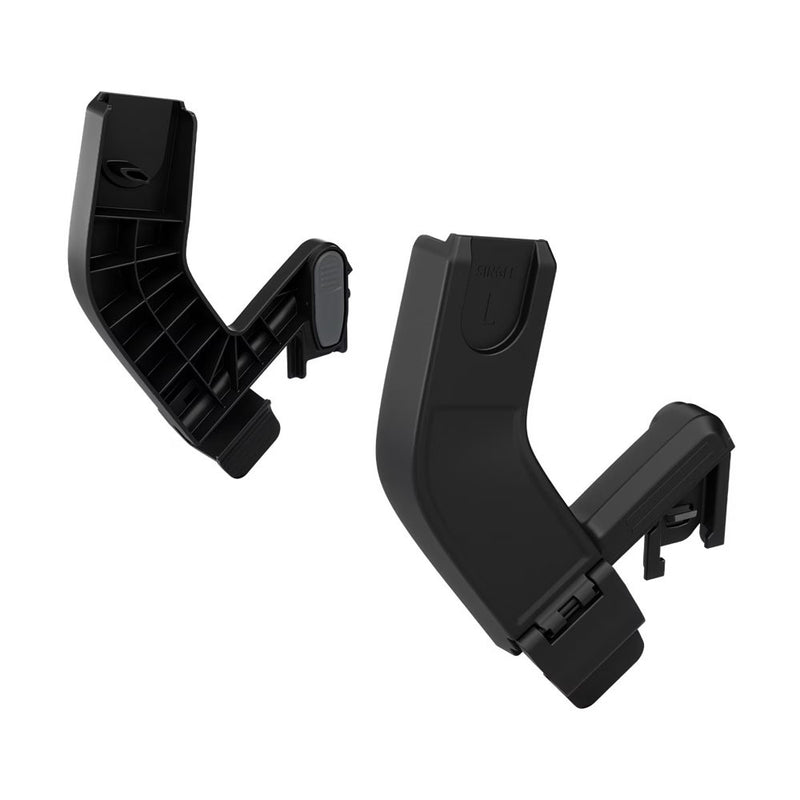 Two black plastic adapters labeled “L” and “R” are shown on a white background. The Thule Urban Glide 3 Single Maxi-Cosi Car Seat Adapter by Thule is designed for use with the Urban Glide 3 stroller and is compatible with Maxi-Cosi car seats.