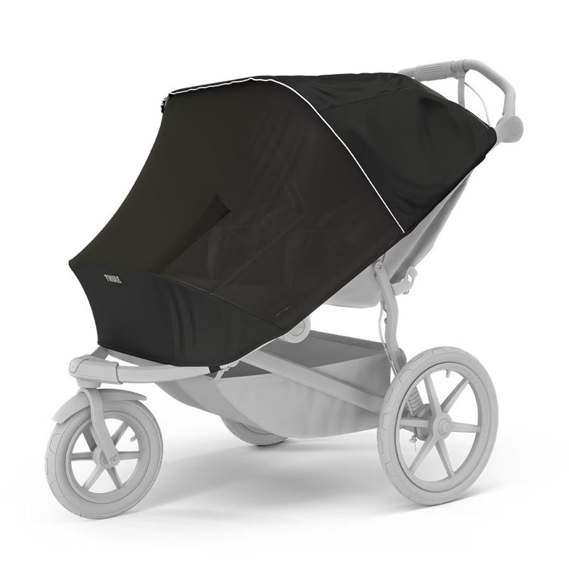 The Thule Urban Glide 3 Double Mesh Cover by Thule shields the stroller seat from insects with its black mesh cover, fitting over the light gray jogging stroller while keeping the handlebar and large wheels uncovered.