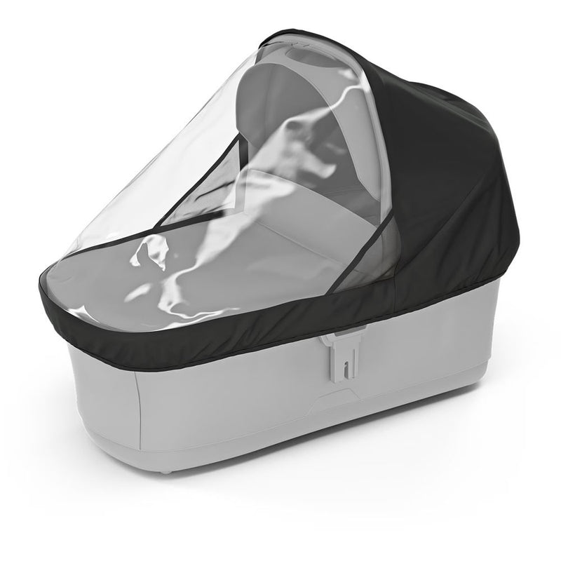 The Thule Urban Glide 3 Bassinet Rain Cover by Thule provides clear visibility and weather protection for your baby in a white bassinet with a black canopy.