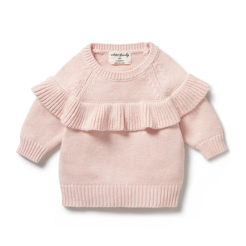 The Wilson & Frenchy Pink Knitted Ruffle Jumper features long sleeves, ribbed cuffs and hem, and a ruffled detail across the chest and shoulders in a soft cotton bamboo wool blend.