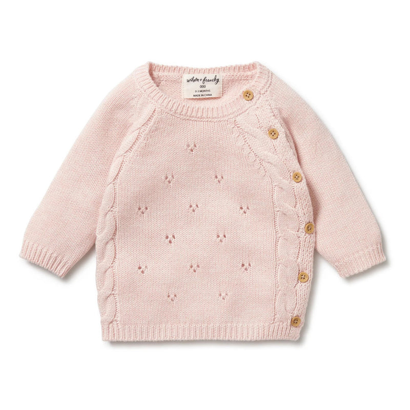 The Wilson & Frenchy Pink Knitted Pointelle Kimono Cardigan features a light pink cable pattern, diamond-shaped pointelle front, and four wooden buttons; crafted from soft cotton bamboo wool.