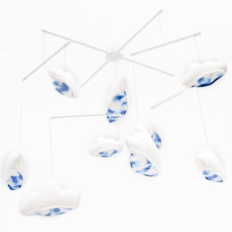 The Snoo Sky Mobile by Happiest Baby features white and blue wool clouds hanging delicately, creating charming nursery décor, displayed against a plain white background.