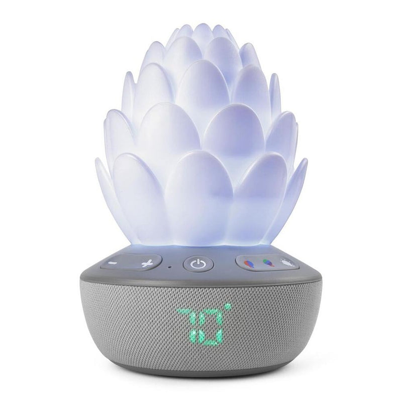 The Skip Hop Terra Cry Activated Soother by Skip Hop features a soft, glowing lotus-shaped nightlight, built-in speaker, and digital temperature display—all in a sleek gray base with easy control buttons.