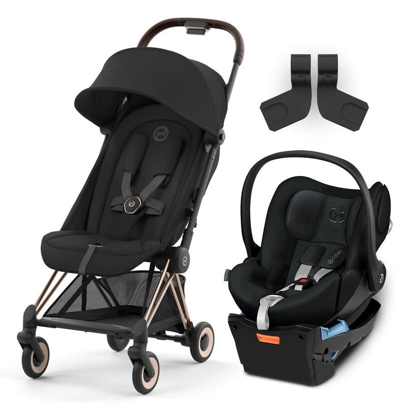 The Cybex Coya Pram + Cloud Q Capsule travel system by Cybex, in black, with base and two car seat adapters, is shown against a white background.