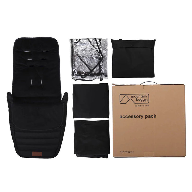 The Mountain Buggy Nano Urban Accessory Pack by Mountain Buggy includes a padded seat liner, stroller covers, foot muff, storage pouch, three folded accessories, and a branded box—all displayed on a white background.
