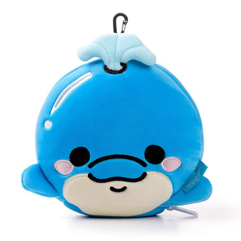 The Relaxeazzz Dolphin Travel Pillow is a round blue plush toy shaped like a smiling whale with pink cheeks, white belly, fins, and water spout. It features a keychain clip for easy travel and is part of the Relaxeazzz collection.