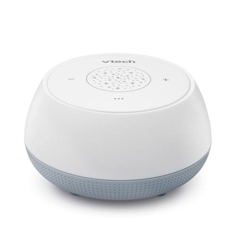 The Vtech BC8213 Vhush Mini Storytelling Soother is a white and light gray, round sleep soother featuring top speaker holes, easy touch controls for volume and playback, and soothing bedtime functions—perfect for relaxation.