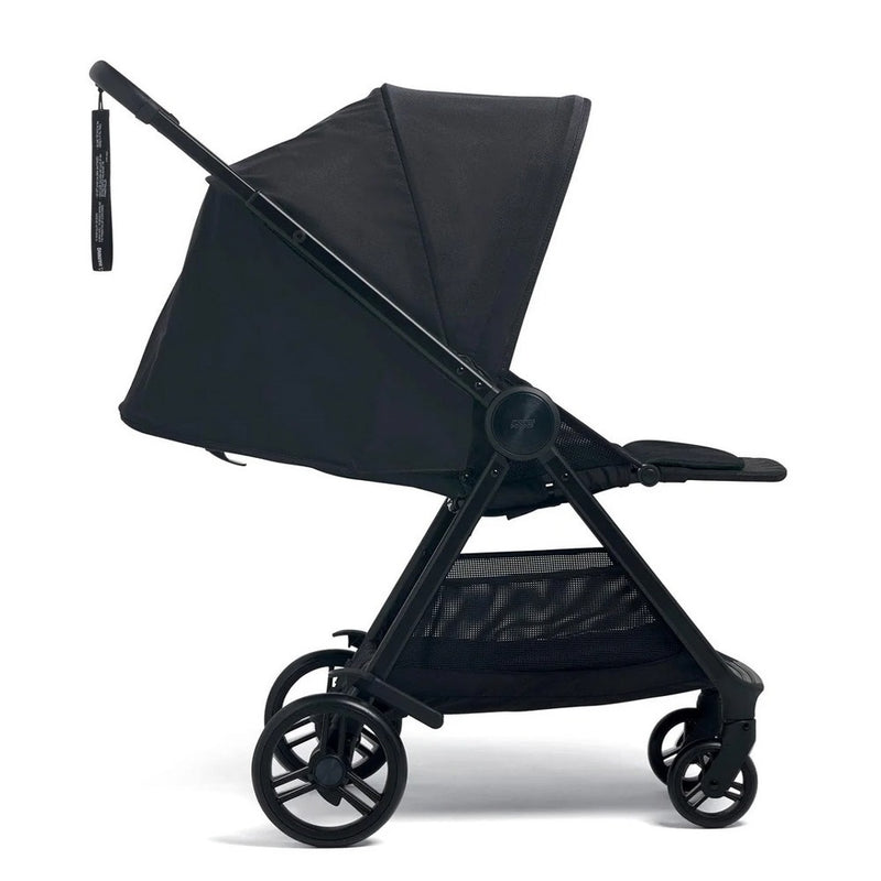 The Mamas & Papas Libro Pram Liquorice is a black, ultra-slim stroller with four wheels, a sunshade canopy, and storage basket. Its lightweight design and one-hand fold make it ideal for parents on the go. Shown in side view on white background.