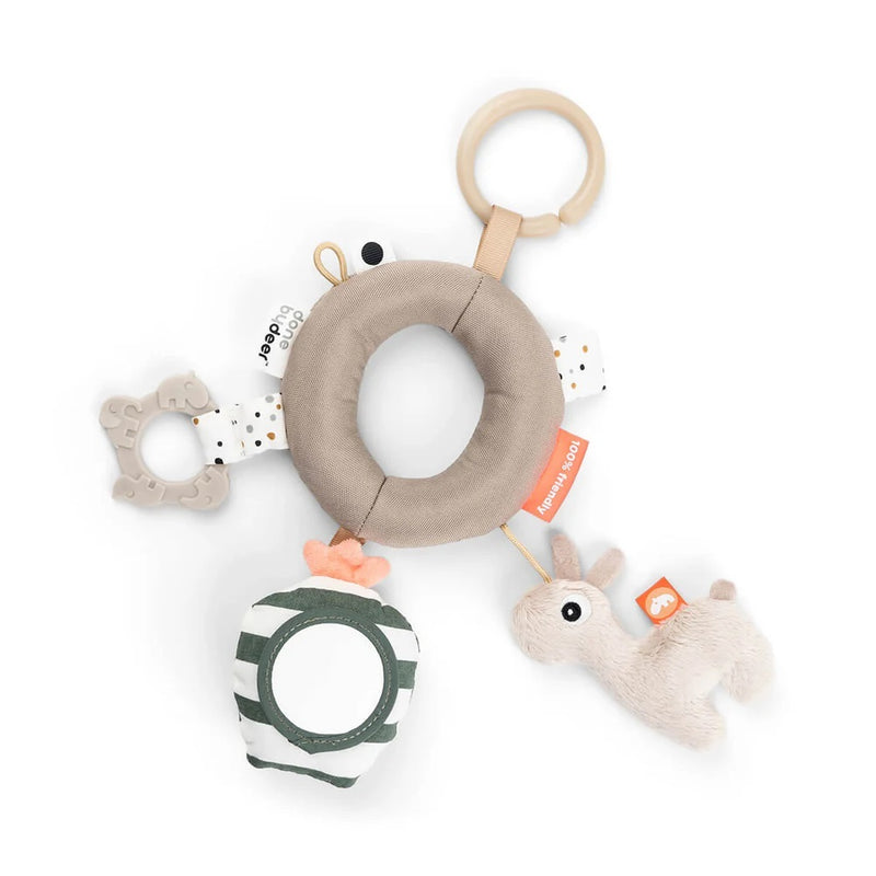 The Done By Deer Activity Ring Lalee Sand by Done By Deer features a soft teether, plush bunny, mirrored disk with green stripes, and fabric elements—all attached to a wooden ring for easy holding or hanging.