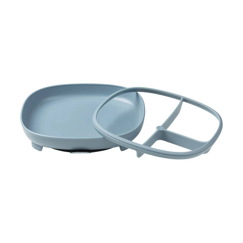The b.box B.Box 2 In 1 Suction Plate Ocean is a light blue, rectangular baby plate with rounded edges and a removable adjustable divider for three food sections, designed to keep foods separate.