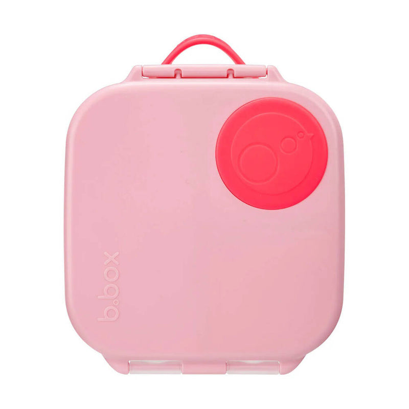 The b.box B.Box Mini Lunchbox Flamingo Fizz features rounded edges, a red circular vent on the lid, leak-proof compartments, and a small pink top handle. The b.box logo is embossed on the left side of the lid.