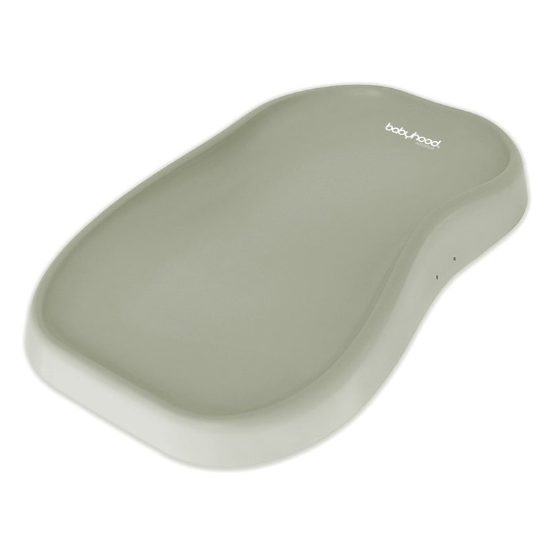 The Babyhood Ultimate Change Pad is a contoured, sage green pad with high sides and raised edges for safety, featuring the Babyhood logo and an easy-to-clean surface for daily convenience.