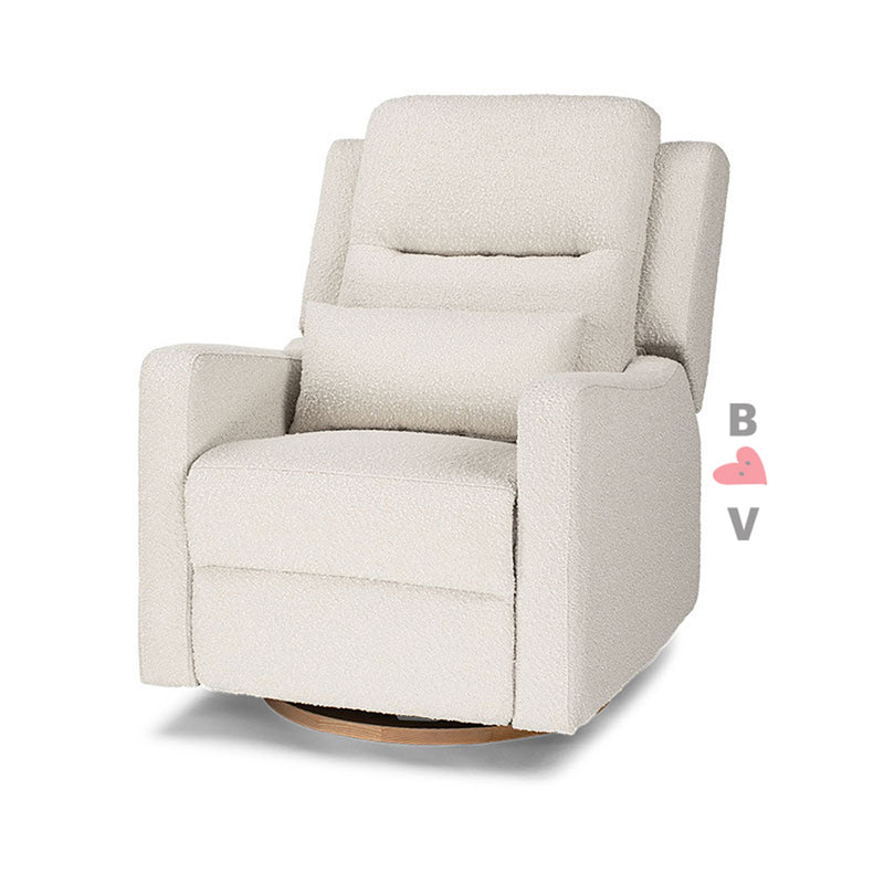 The Cocoon Rio Electric Recliner & Glider Chair with USB in Vanilla Boucle features a plush, modern white design with cushioned back, armrests, and a wooden swivel base. A small pink heart appears beside vertically stacked "B" and "V" letters.