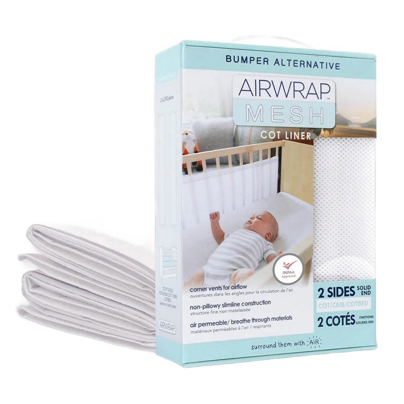 A box of Airwrap Mesh Cot Liner 2 Sides by Airwrap is shown partially unboxed. The packaging displays a baby in a crib with the breathable liner installed, highlighting airflow and its use as a 2-sided cot bumper alternative.